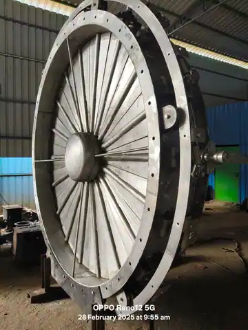 Large-scale metallic inlet guide vane assembly with radial blades for high-volume industrial fans